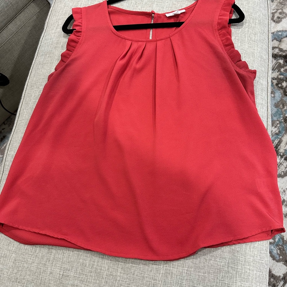 Women’s sleeveless coral blouse